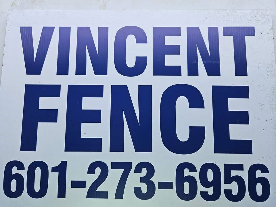 White yard sign reading VINCENT FENCE with the phone number 601-273-6956 in navy letters